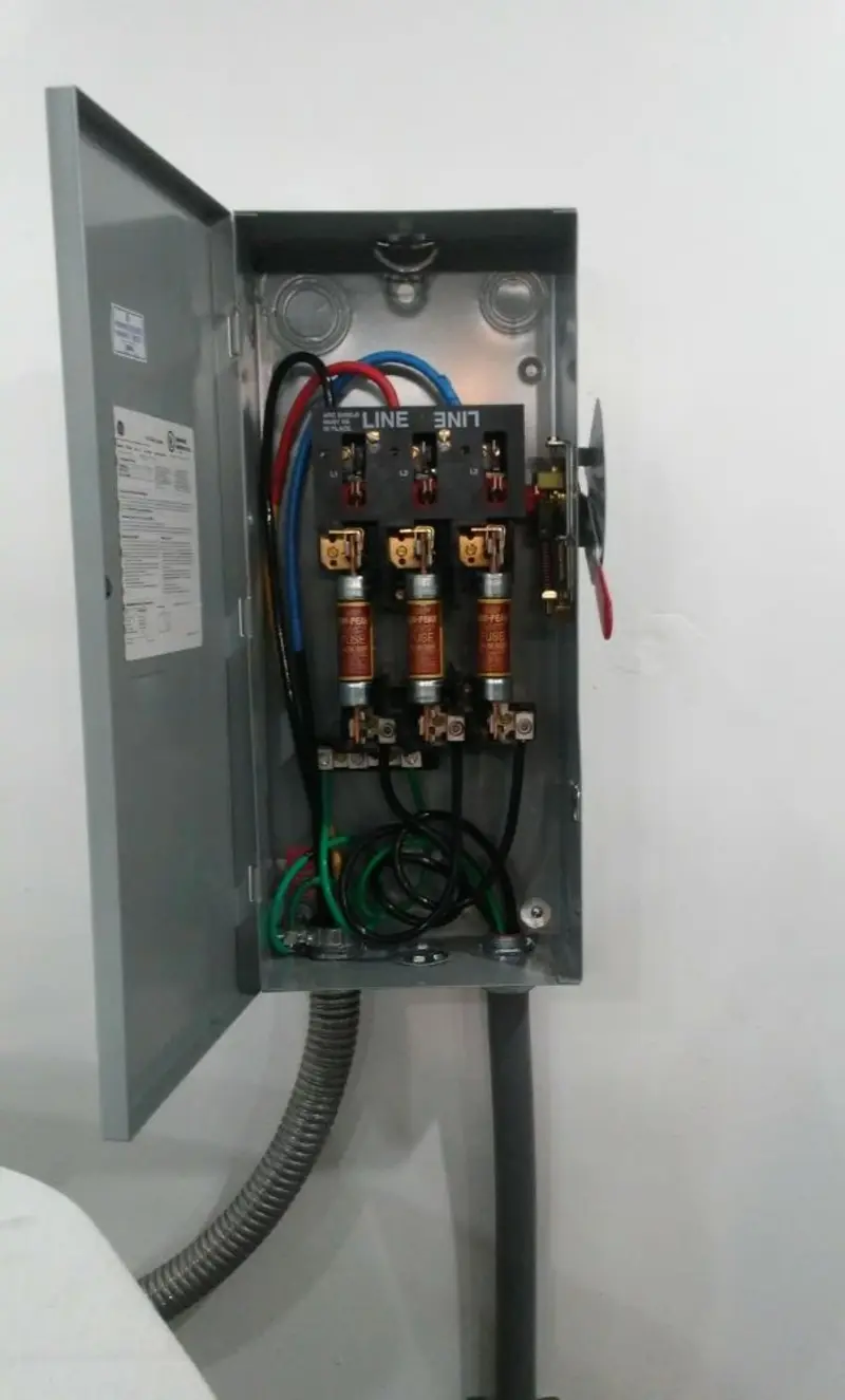 Three-phase disconnect switch installed for Smoke Detector Installation in Cedarhurst